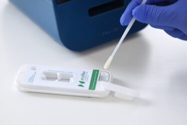 sustainable diagnostics test cartridge being used